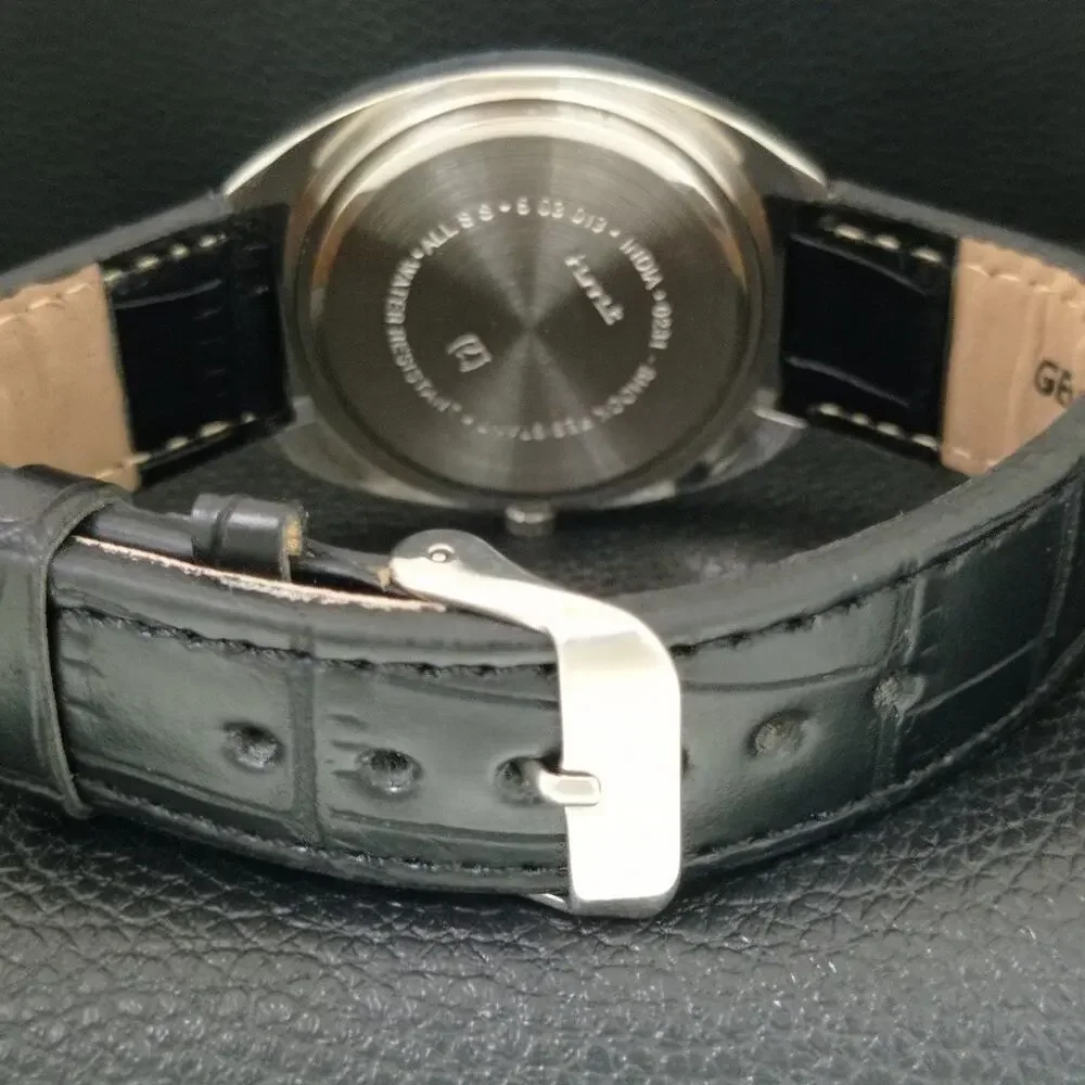 Vintage 1982 HMT Manual Wound Mens Silver Watch & Blue accents